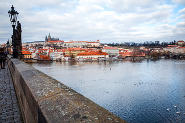 Fototapeta na wymiar Old Town ancient architecture and river pier in Prague, Czech Re