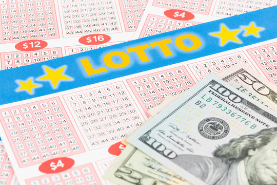 Lotto ticket gambling with dollar banknote, ticket is mock-up
