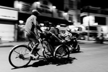 abstract movement of cyclo driver in vietnam