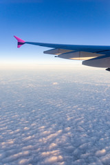 Obraz premium view of planet earth from an airplane through the window