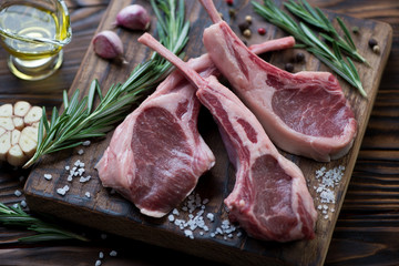 Close-up of raw fresh lamb shoulder rack steaks, selective focus