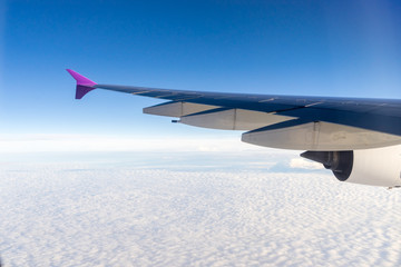 Obraz premium view of planet earth from an airplane through the window