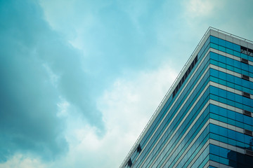 Fototapeta na wymiar Glass building with blue sky