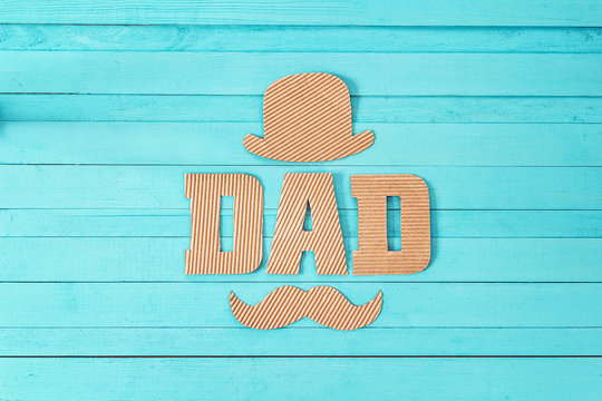 Fathers day background with cardboard letters hat and mustache.