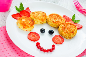 Cheese pancakes with fresh summer berries