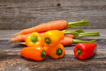 Vegetables on old wooden background