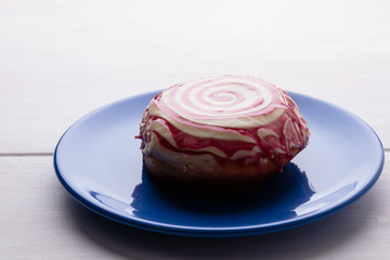 donut on blue plate