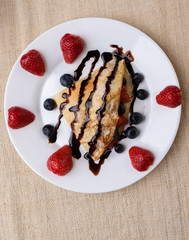 pancake with fruits and chocolate syrup
