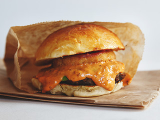 Tasty grilled prawn and beef burger