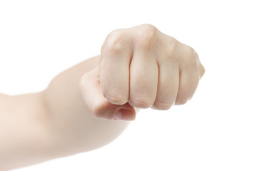 young female fist straight to camera, isolated on white background