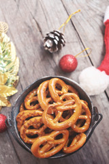 Cookies pretzels with christmas hat