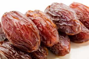 Date fruits in white plate - Ramadan, Eid background