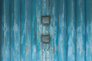 Grunge metal door texture background. Architectural element.