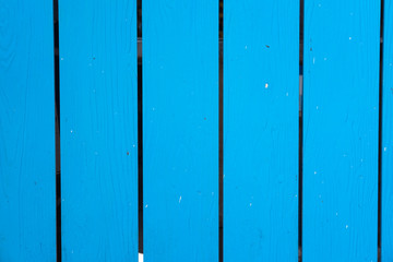 Textured wood planks painted in blue