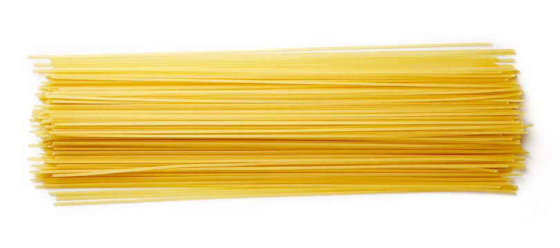 Spaghetti pasta isolated on white, from above