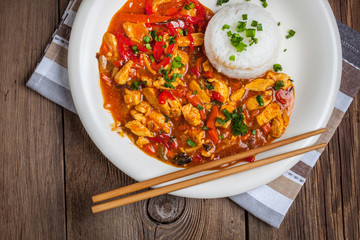 Chinese chicken with vegetables and rice.