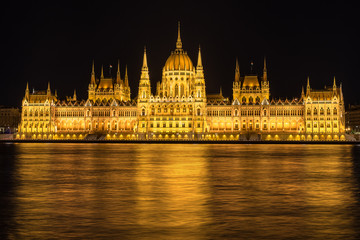 Fototapeta na wymiar The Hungarian Parliament on the Danube River in Budapest