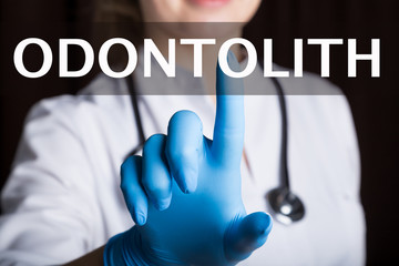 technology, internet and networking in medicine concept - medical doctor presses odontolith button...