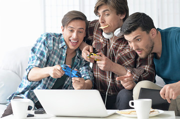 men playing computer games