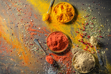 Mess with vivid spices on old board