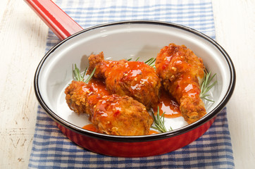 spicy chicken drumstick with rosemary and hot chilly sauce