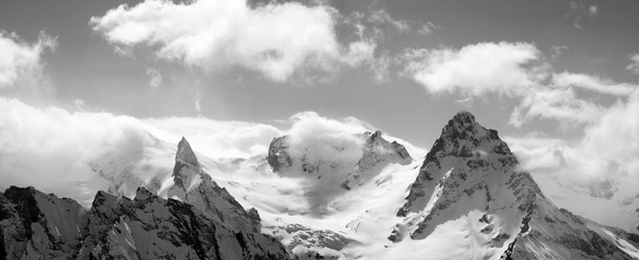Black and white panorama mountains in cloud