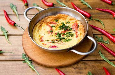 breakfast. Fried eggs with tomatoes