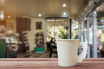 Coffee paper cup in coffee shop