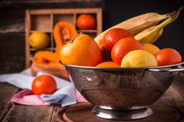 A selection of various fresh yellow raw organic produce fruits and vegetables