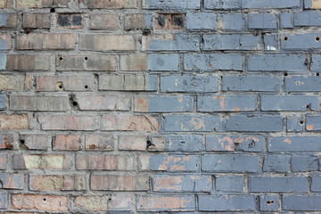 a fragment of a brick wall painted