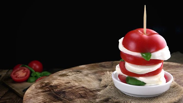 Tomato with Mozzarella Cheese as not loopable 4K footage