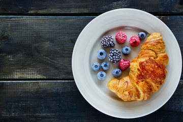 Croissant and berries