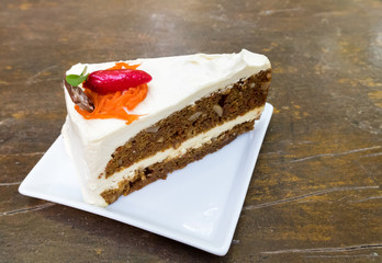 Carrot cheesecake , carrot cake on wood table background