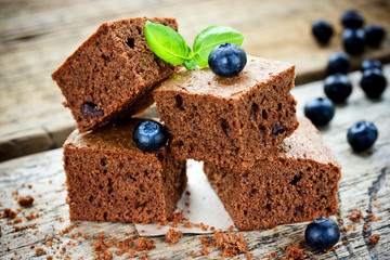 Classic American dessert chocolate brownie with blueberry