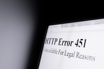 HTTP error 451 Unavailable For Legal Reasons - Shining computer screen in dark space - censorship...
