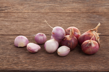Shallots on a wooden floor