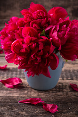 Bouquet of red peonies, copy space