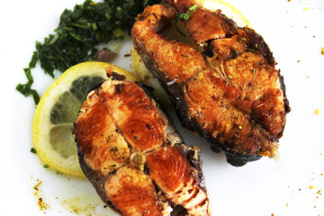 fried salmon with spicy herbs and lemon