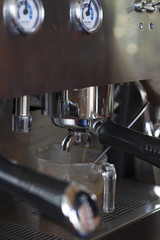 Fototapeta na wymiar makes coffee using coffee machine.