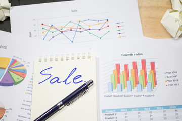 growth rate of Sale analysis report show success result as charts and graphs on document paperwork, corporate financial and business concepts
