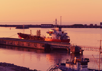 Dry dock at Marina in Ventspils at sunset