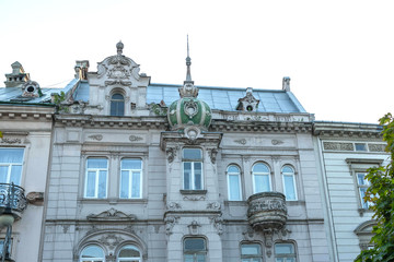  facade of the old house with a balcony