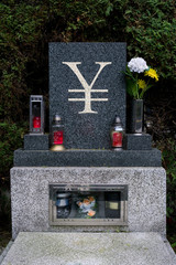 Gravestone with metaphor meaning: Economical collapse of China and its currency, Chinese Juan -...