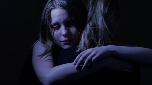 Sad teenager daughet and her loving mother. 4K UHD