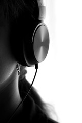 silhouette of a woman with headphones