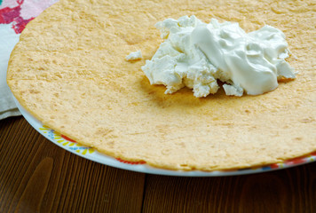 Guirila with crumbled white cheese.