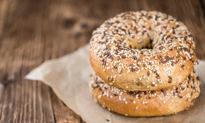 Wholemeal Bagels on wooden background