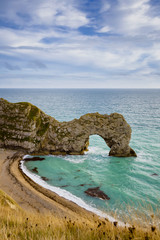 Portrait format view of Durdle Door in Dorset on the south coast of England, UK. This is a Jurassic Coast World Heritage site.