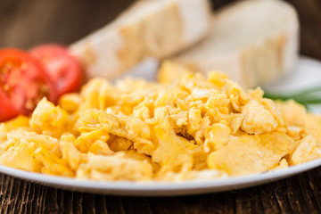Plate with scrambled Eggs (close-up shot)