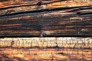Alte von der Zeit gezeichnete Holzbretter eines Bauernhofs.